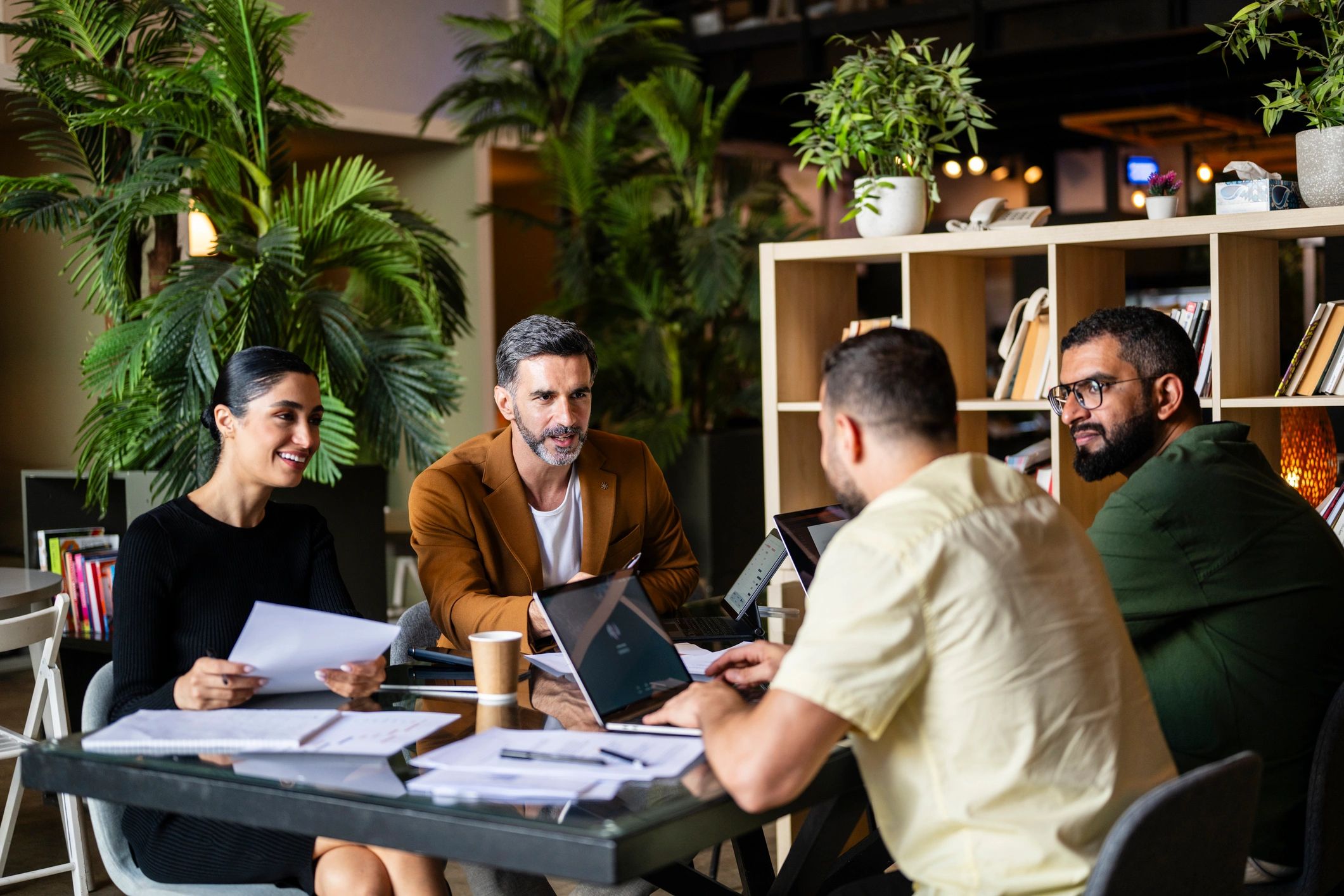 Editorial team collaborating in a meeting